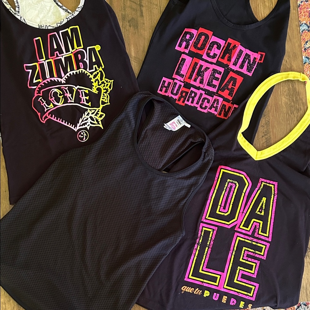 4 Zumba® Black Tank Tops with Neon Accents.  Bundle of 4, all different.
